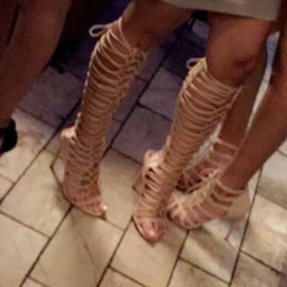 Nude mid knee high strapped heels